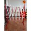แผงกั้นเหล็กยืดได้ ขนาด 1.05 x 0.15 - 2.5 เมตร สีแดง - ขาว