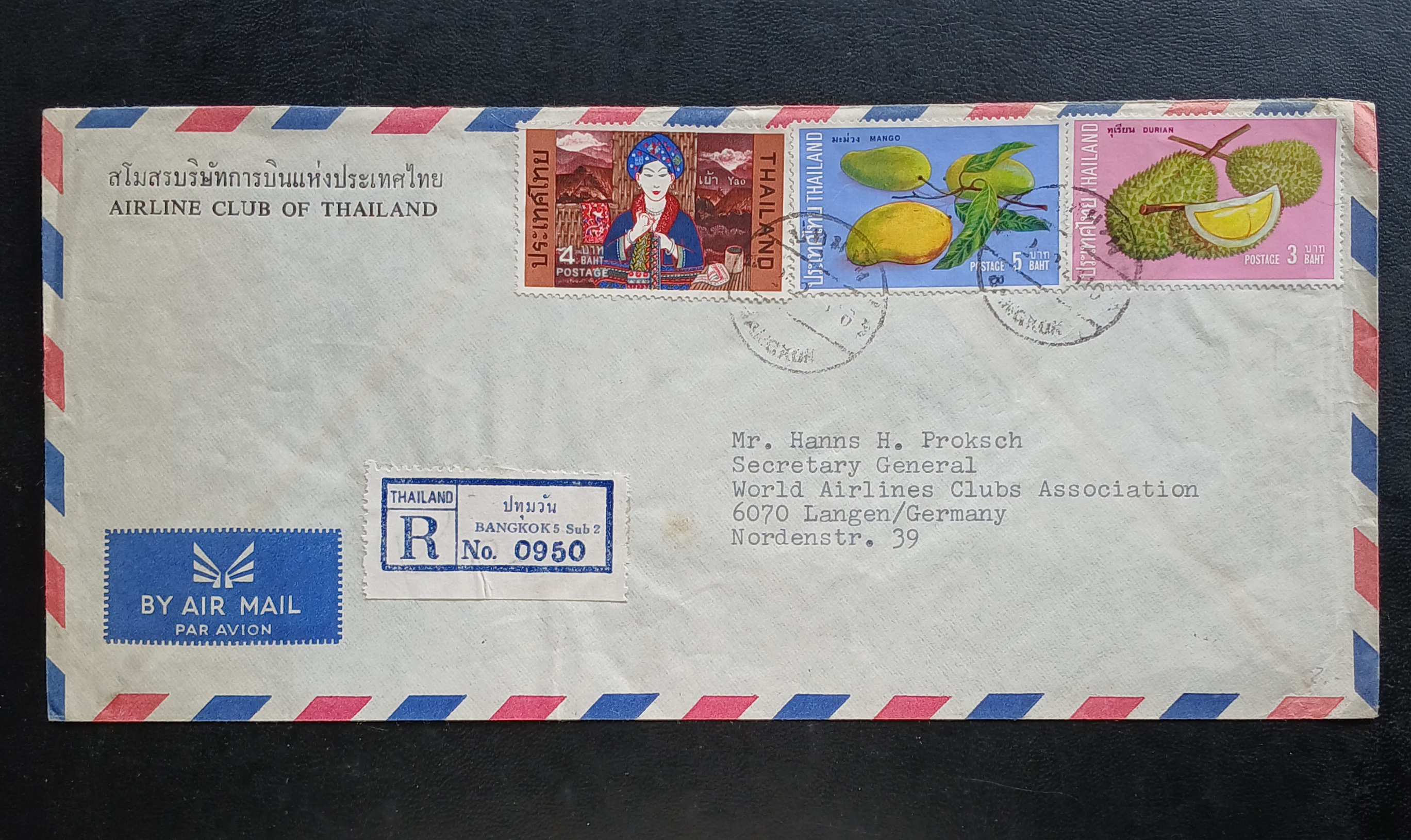 ซองจดหมายลงทะเบียน BANGKOK-GERMANY ป้ายR ปทุมวัน /REGISTERED ติดแสตมป์ชาวเขา และผลไม้ไทย ปี 2515 มีตราประทับ ปทุมวัน ปีติดไม่ชัด (น่าจะ 2516)