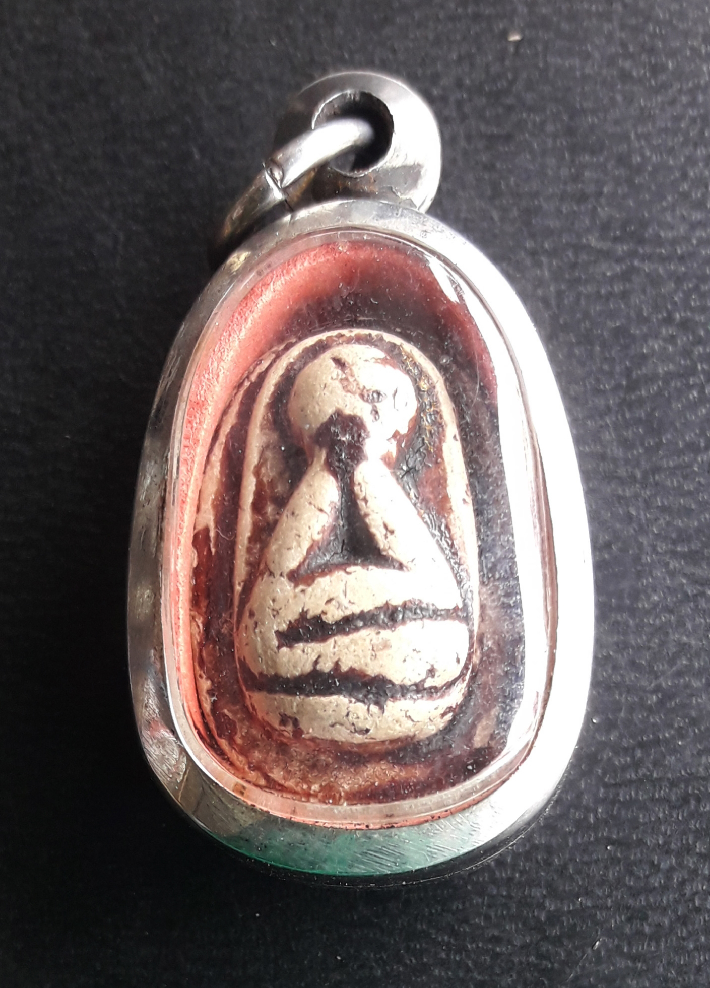 พระปิดตาเม็ดบัว ว.น.จ. หลวงพ่อยิด วัดหนองจอก ประจวบคีรีขันธ์ เนื้อผง พร้อมกรอบครับ