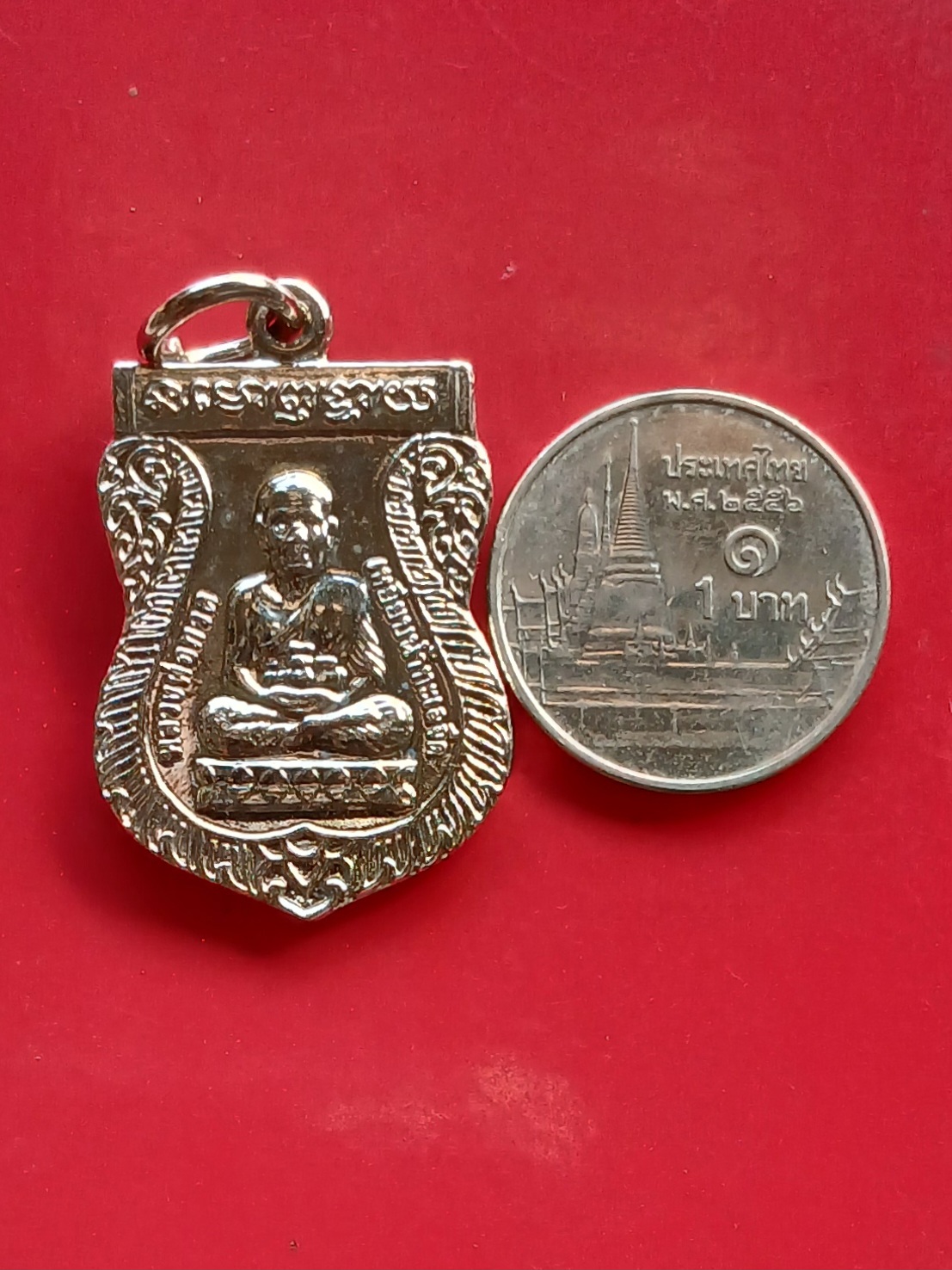 เหรียญเสมาหลวงพ่อทวด หลังอาจารย์ทิม พระประจำปี ออกวัดช้างให้ ปัตตานี ปี 2549 เนื้อทองแดงชุบนิเกิ้ล (ตอกโค๊ต ๔๙)