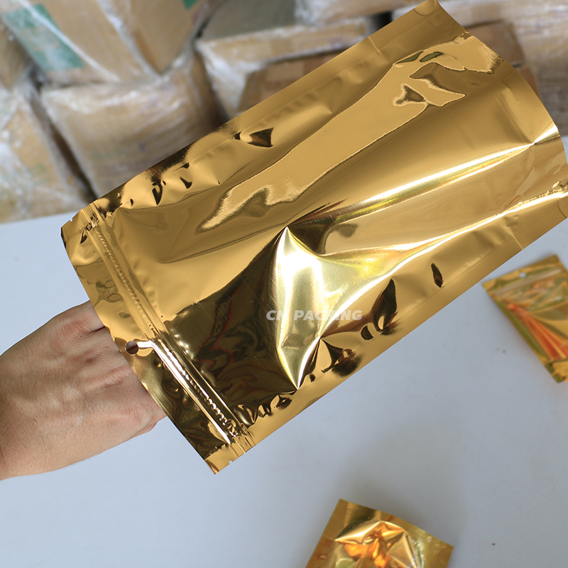 ถุงซิป สีทอง หน้าใส หลังทอง ตั้งได้ ใสวิ้ง สำหรับใส่ขนม ของกิน ผลไม้อบแห้ง (50 ใบ)