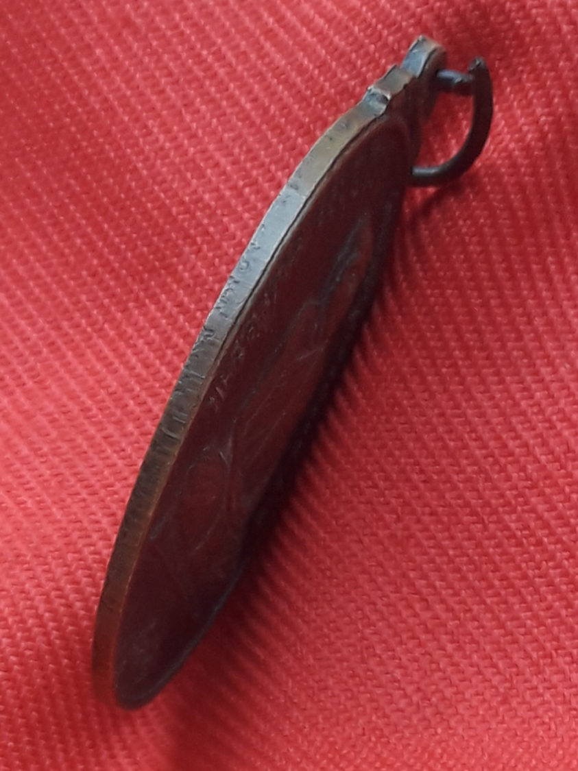 เหรียญเสือเผ่น รุ่น 1 พระครูจรัส อธิปุญโญ อนุสรณ์สร้างพระอุโบสถ วัดฤาษีนุตจรัสวงษาราม จ.สระบุรี ปี 2525