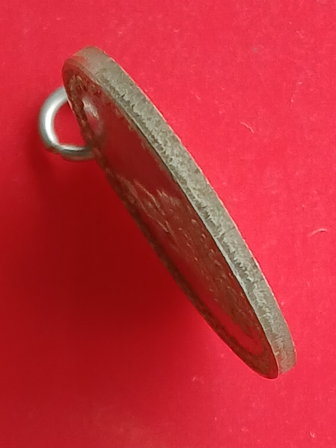 เหรียญพระพุทธอังคีรส หลังพระปิดตา วัดจุฬามุนี จ.ระยอง ปี 2516 หลวงพ่อสุกรี คุณังกาโร เนื้อนิกเกิล จากเหรียญกษาปณ์ในหลวง ร.9 หลังครุฑ ๕ บาท เหรียญนี้ติดลายปีกครุฑด้านหน้าเหรียญ