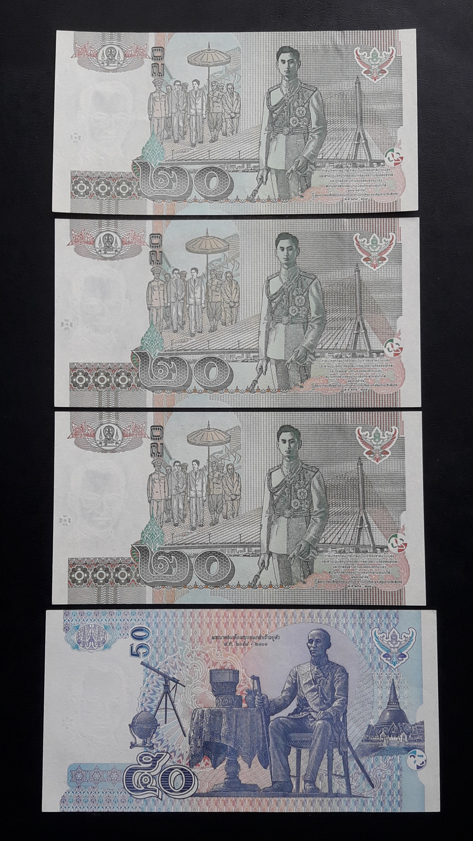 ธนบัตร รัชกาลที่ 9 ชนิดราคา 50 บาท แบบ 15 เลข 5955553 สภาพพอดี มีรอยพับ ไม่ขาด ไม่รู + ธนบัตร 20 บาท แบบ 15 มีเลขเรียงกัน 2 ใบ ไม่ผ่านการใช้ รวม 4 ฉบับ