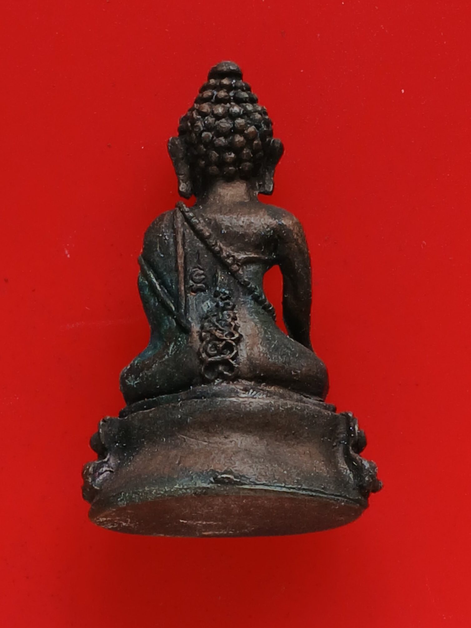 พระกริ่งสมปรารถนา หลวงพ่อหยอด วัดแก้วเจริญ สมุทรสงคราม ปี 2537 เนื้อทองแดง ตอกโค้ตด้านหลัง