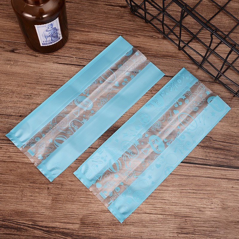 ถุงซองขุ่นขยายข้างลายการ์ตูนสีฟ้า ขนาด9x23+5.5cm. แพ็ค50ชิ้น