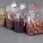 ถุงหูหิ้วเนื้อใส ขนาด 22x11x35 cm. 50 ชิ้น รหัสสินค้า : 005658